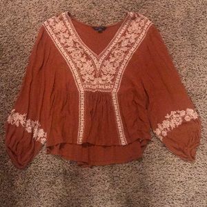 Burnt orange blouse